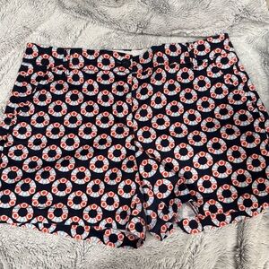 Crown & Ivy chino shorts featuring a navy blue and orange life ring pattern 8